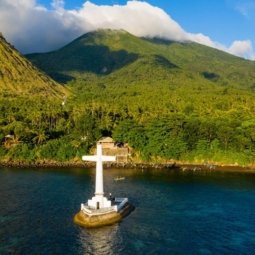 Sunken cemetery off the volcanic tropical island of Camiguin