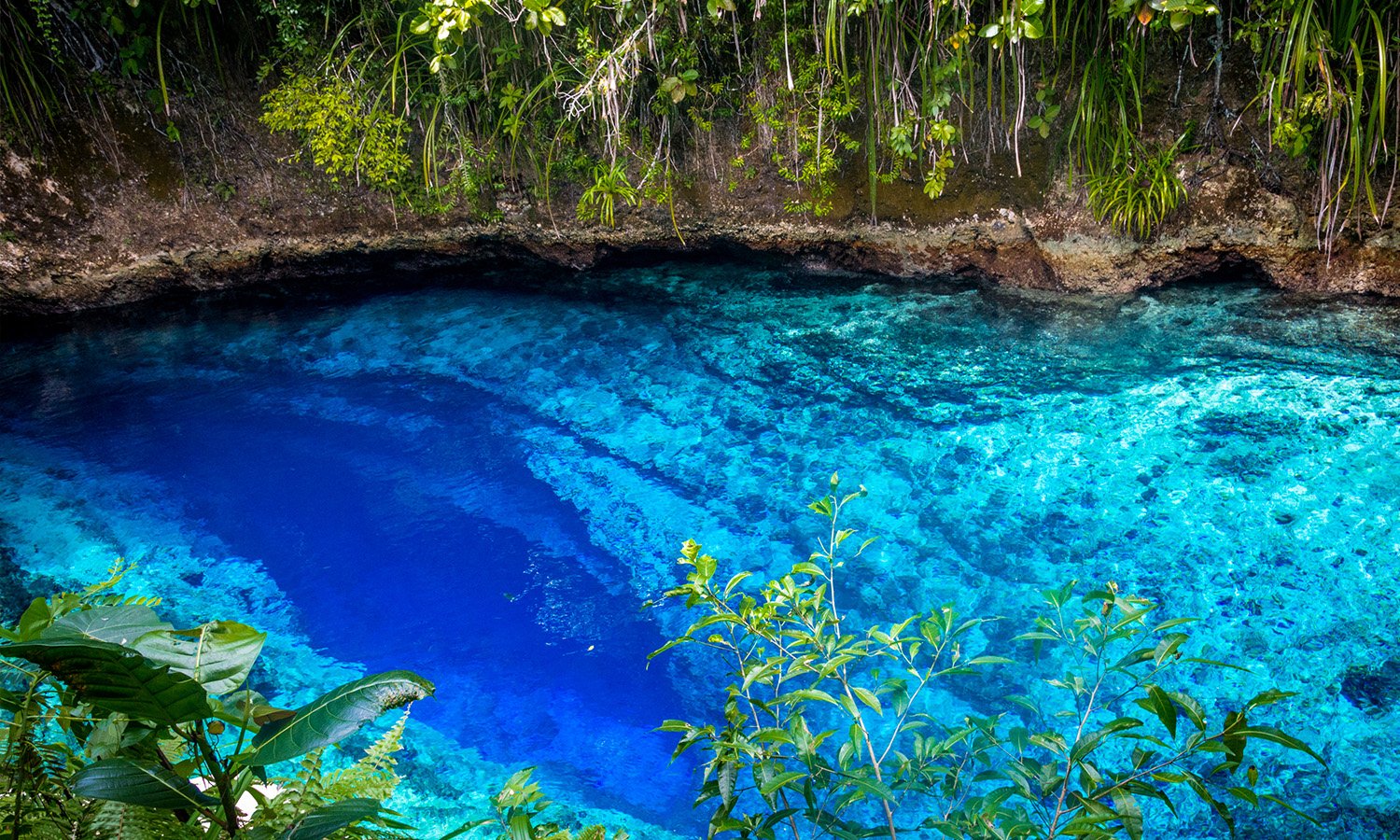 Hinatuan Enchanted River deep blue water