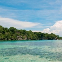 Island garden city of Samal with clear turquoise water 