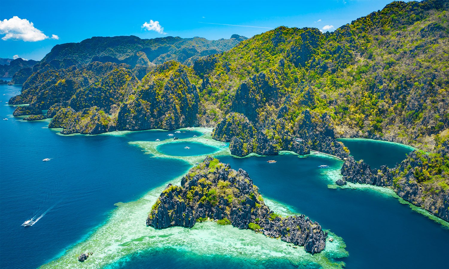 Aerial view of Coron Island reefs and limestone formations